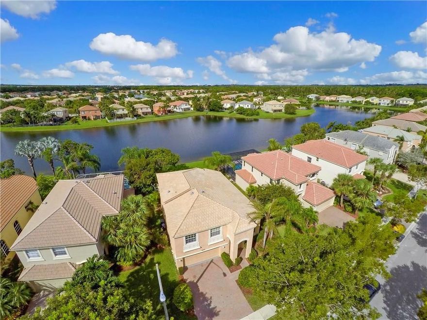 Fabulous Lakefront 4 bed, 3 bath home in highly desirable Olympia! Beautiful curb appeal including lush landscaping, Paver driveway, Covered entry welcomes you Home. Bed w/Full Bath downstairs. Soaring Ceilings. Gourmet Kitchen w/ Granite, Brand new Stainless Appl. Building newly painted, Master Suite upstairs w/Spacious Bath / Separate Tub & Shower. Open Patio with a stunning view of the lake. Hurricane Shutters, great schools, close to Mall, restaurants and entertainment. SELLER MOTIVATED, BRING OFFERS!