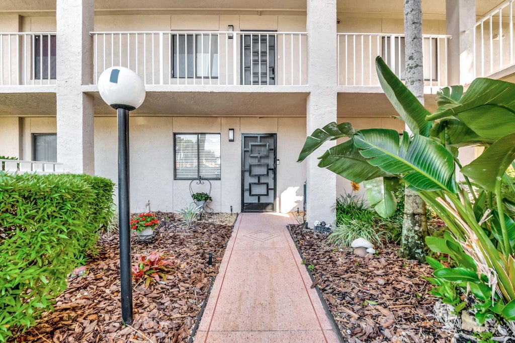 Photo of 6241 Pointe Regal Circle #105, Delray Beach, FL 33484 (MLS # R11064763)