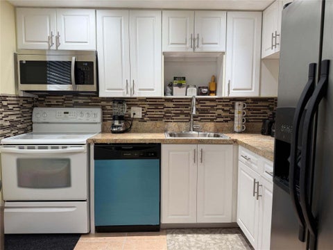 Tiny photo for 1015 Country Club Drive #307, Margate, FL 33063 (MLS # B26036011)