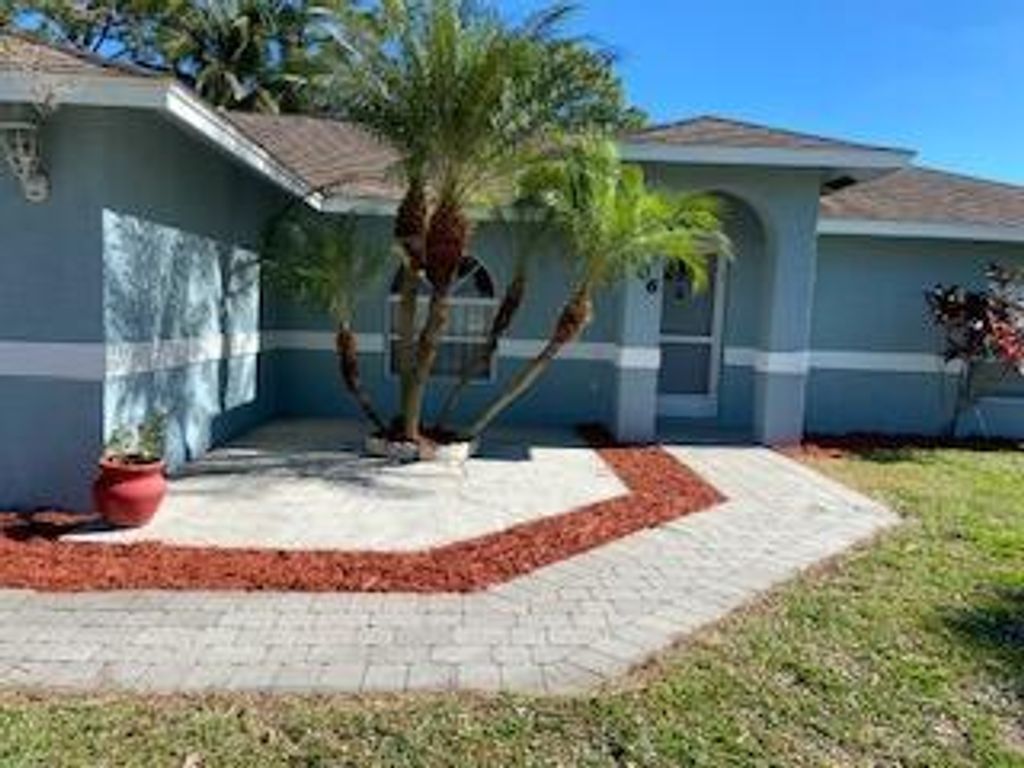 Photo of 106 SE Crosspoint Drive, Port Saint Lucie, FL 34983 (MLS # R10766764)