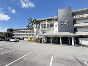 Photo of 941 CRYSTAL LAKE Drive #105, Deerfield Beach, FL 33064 (MLS # B26091737)