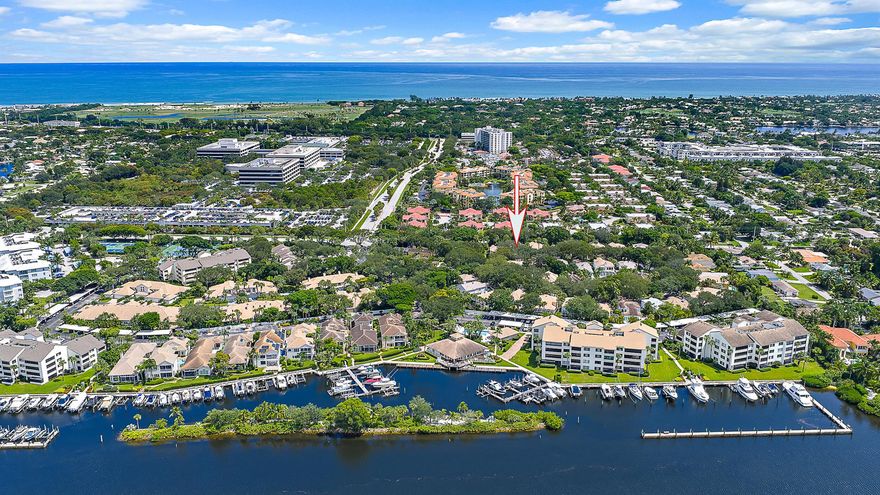 Located in the Intracoastal-front gated community of Oak Harbour this recently renovated home is close to area beaches and has access to rentable boat slips within the community. The interior boasts porcelain and wood floors, a Chef's kitchen with stainless appliances, custom cabinetry and quartzite tops. The large master bedroom has volume ceilings and three closets. A large loft overlooks the foyer and can be converted to a fourth bedroom. Oak Harbour has 24/7 security, a club house directly on the Intracoastal with an exercise room, billiard room and full kitchen, tennis courts and two pools. Its prime location is close to area finest restaurants and the Gardens Mall.
