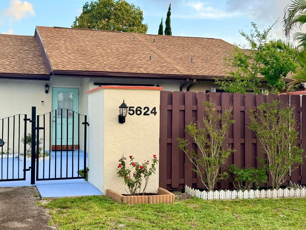 Photo of 5624 Biscayne Drive, Greenacres, FL 33463 (MLS # B26016783)