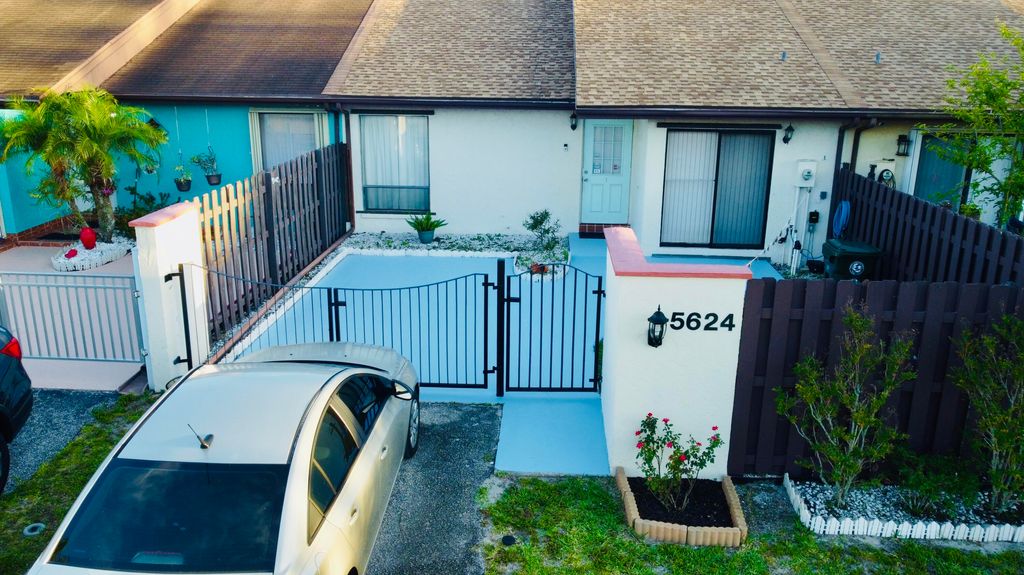 Photo of 5624 Biscayne Drive, Greenacres, FL 33463 (MLS # B26016783)