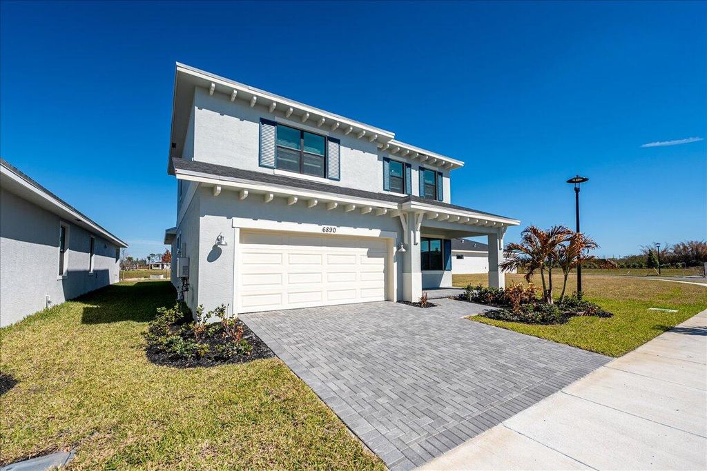 Photo of 6890 NW Kestrel Lane, Port Saint Lucie, FL 34987 (MLS # R11165057)