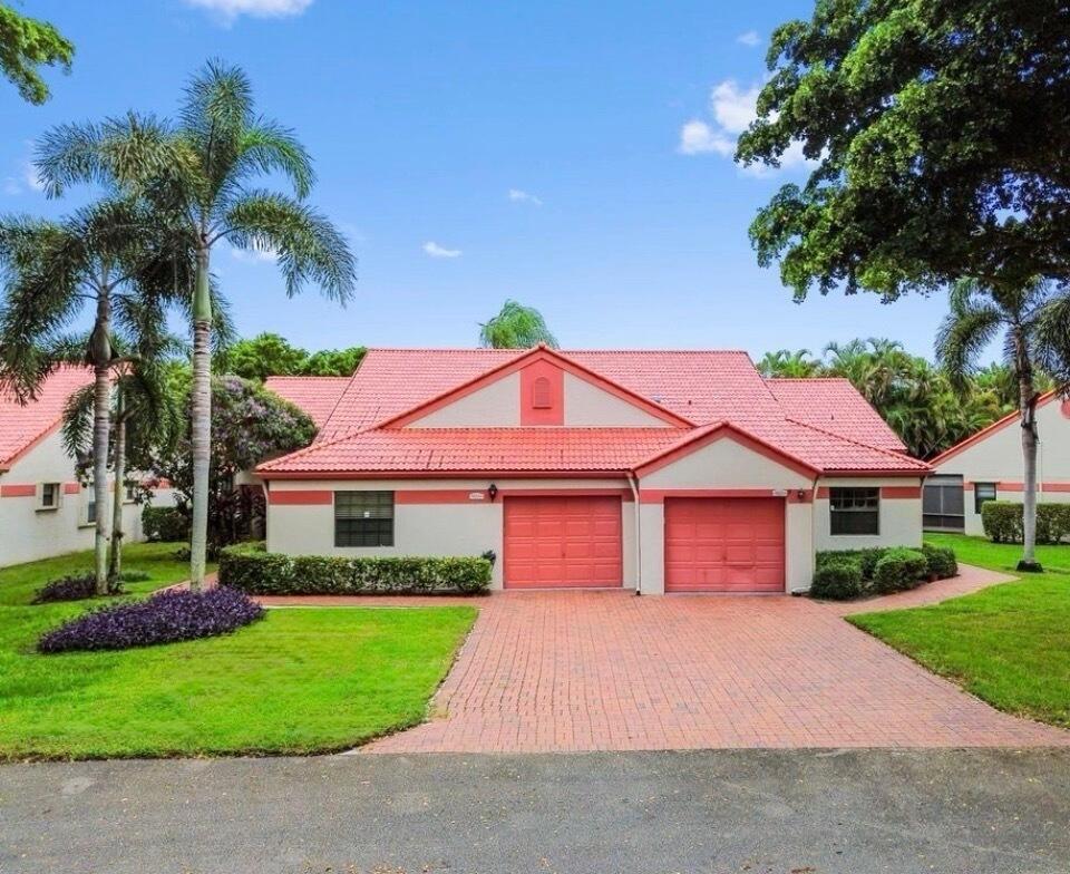 Photo of 7829 Lexington Club Boulevard #A, Delray Beach, FL 33446 (MLS # B26083471)