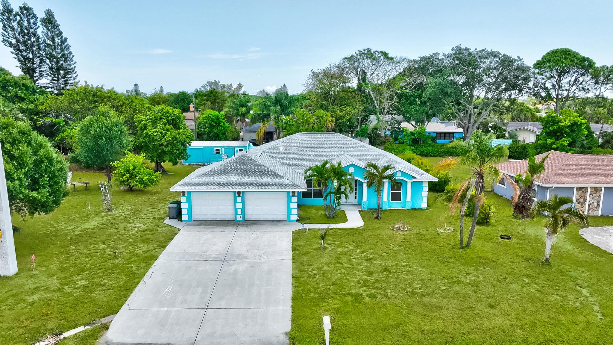 Spacious and well-maintained 3-BR, 2-BA CBS home on a rare double lot totaling 0.58 acres! Built in 2004 with nearly 2,000 sq ft living space, this home offers an open floorplan ideal for entertaining--flowing seamlessly from formal living & dining rooms into the family room & large kitchen. Enjoy year-round comfort in the 260 sq ft enclosed back porch, or relax on the open patio surrounded by nature. Recent updates include a brand-new roof (2025) and fresh paint. Features include tile flooring throughout, oversized 570 sq ft 2-car garage with space for toys, two sheds for extra storage, & irrigation on both lots. City water, sewer, & natural gas available--with the bonus of county-only taxes. Plenty of room to expand, garden, or just enjoy your privacy on this beautifully cleared property