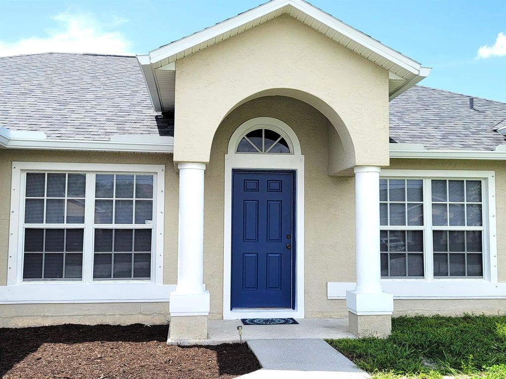 Photo of 3438 SW San Benito Street, Port Saint Lucie, FL 34953 (MLS # R11016126)