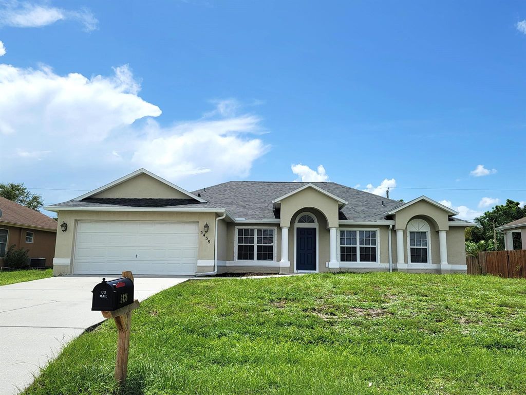 Photo of 3438 SW San Benito Street, Port Saint Lucie, FL 34953 (MLS # R11016126)