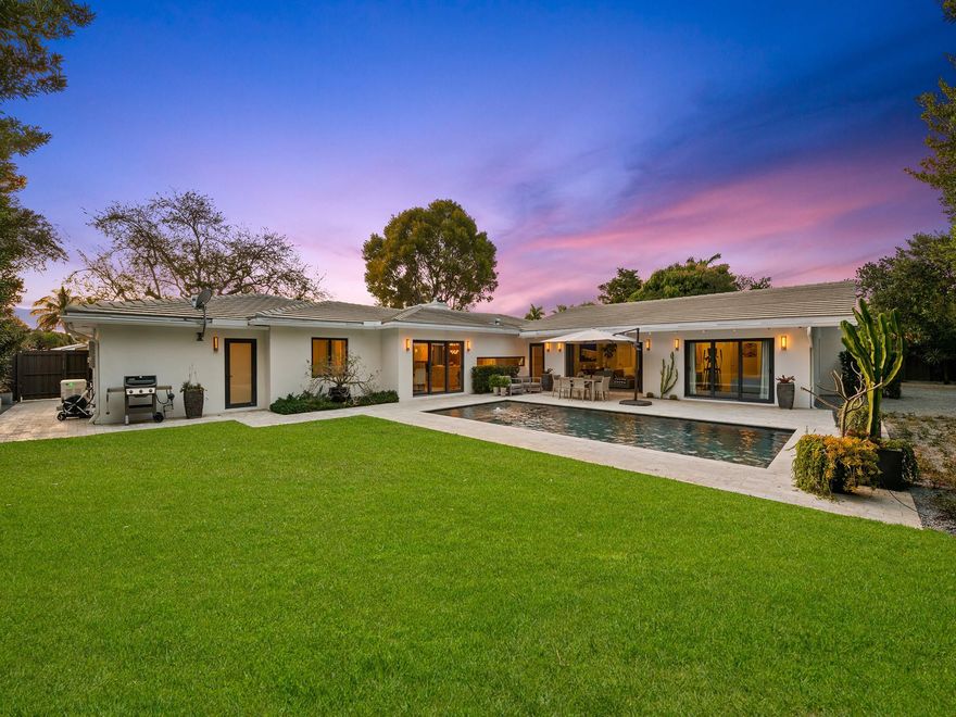 This completely re-envisioned & redesigned residence introduces a heightened standard of modern architecture & design in E. Ft. Lauderdale's coveted enclave of Coral Ridge. Every element has been thoughtfully curated to invoke an elevated lifestyle. Natural light floods the open concept floor plan where multiple living spaces are accentuated by vaulted ceilings. The newly appointed epicurean kitchen with premium appliances inspires those who cook & entertain. The primary suite presents a spa inspired bathroom & generous custom walk-in closet. Sliding doorways reveal a tropical backyard, expansive green area & resort style pool & sun shelf. Ensuite guest bedrooms, new plumbing to the street, full home generator, 500 gal. propane tank, no flood zone & more. Sq. Ft. From Seller's Blueprints.