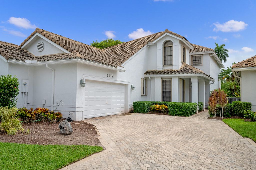 Photo of 2412 NW 63rd Street, Boca Raton, FL 33496 (MLS # B26012712)