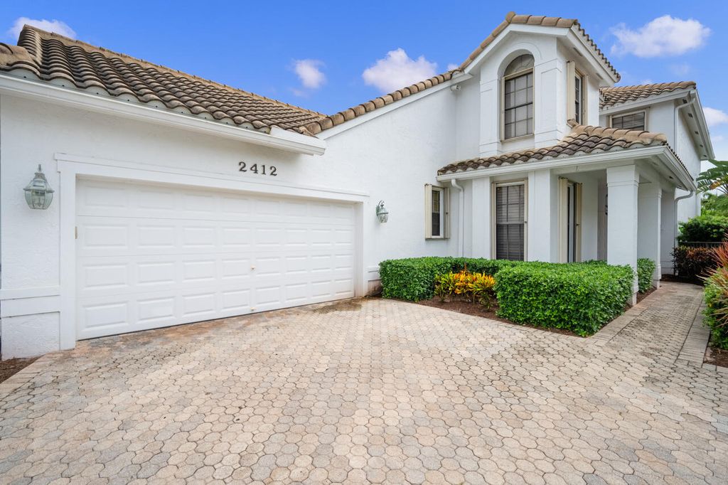Photo of 2412 NW 63rd Street, Boca Raton, FL 33496 (MLS # B26012712)