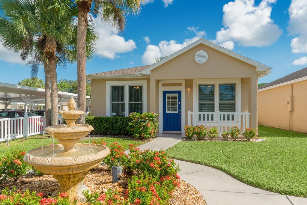 Photo of 593 NW San Remo Circle, Port Saint Lucie, FL 34986 (MLS # R10937924)