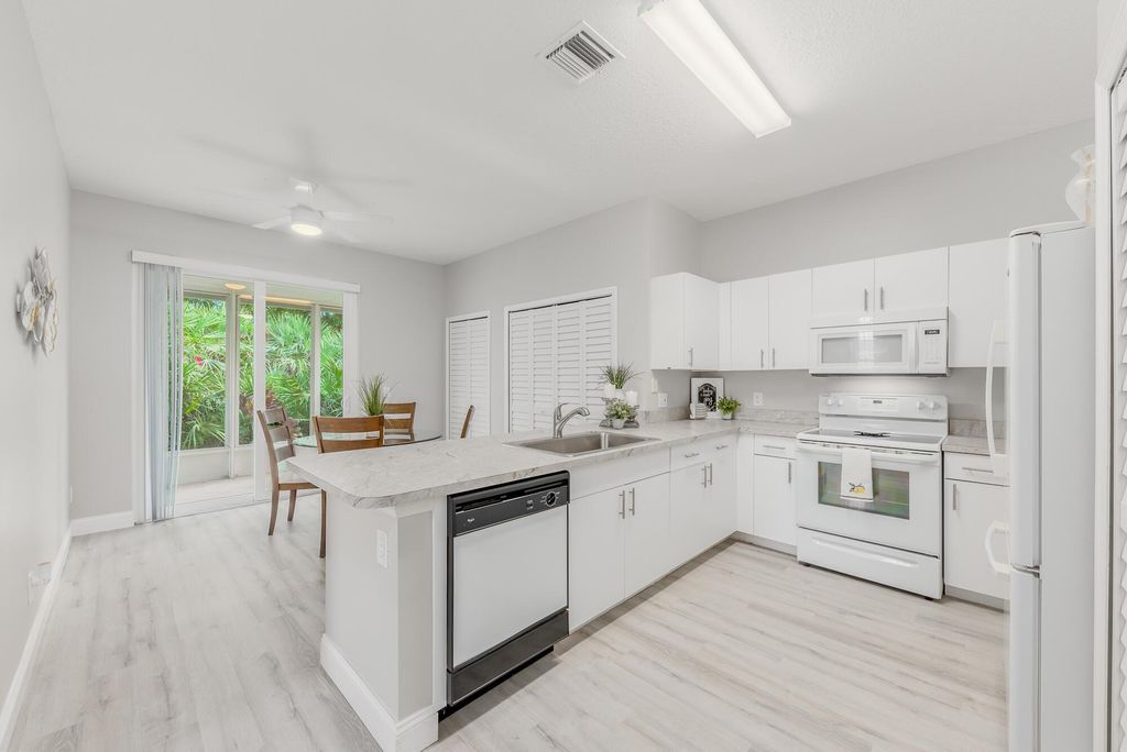 Photo of 593 NW San Remo Circle, Port Saint Lucie, FL 34986 (MLS # R10937924)