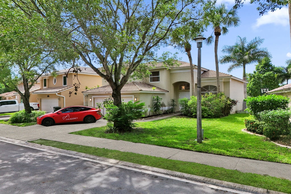 Photo of 4032 NW 63RD Street, Coconut Creek, FL 33073 (MLS # B26077113)