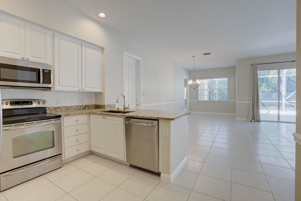 Photo of 256 San Remo Drive, Jupiter, FL 33458 (MLS # B26045157)