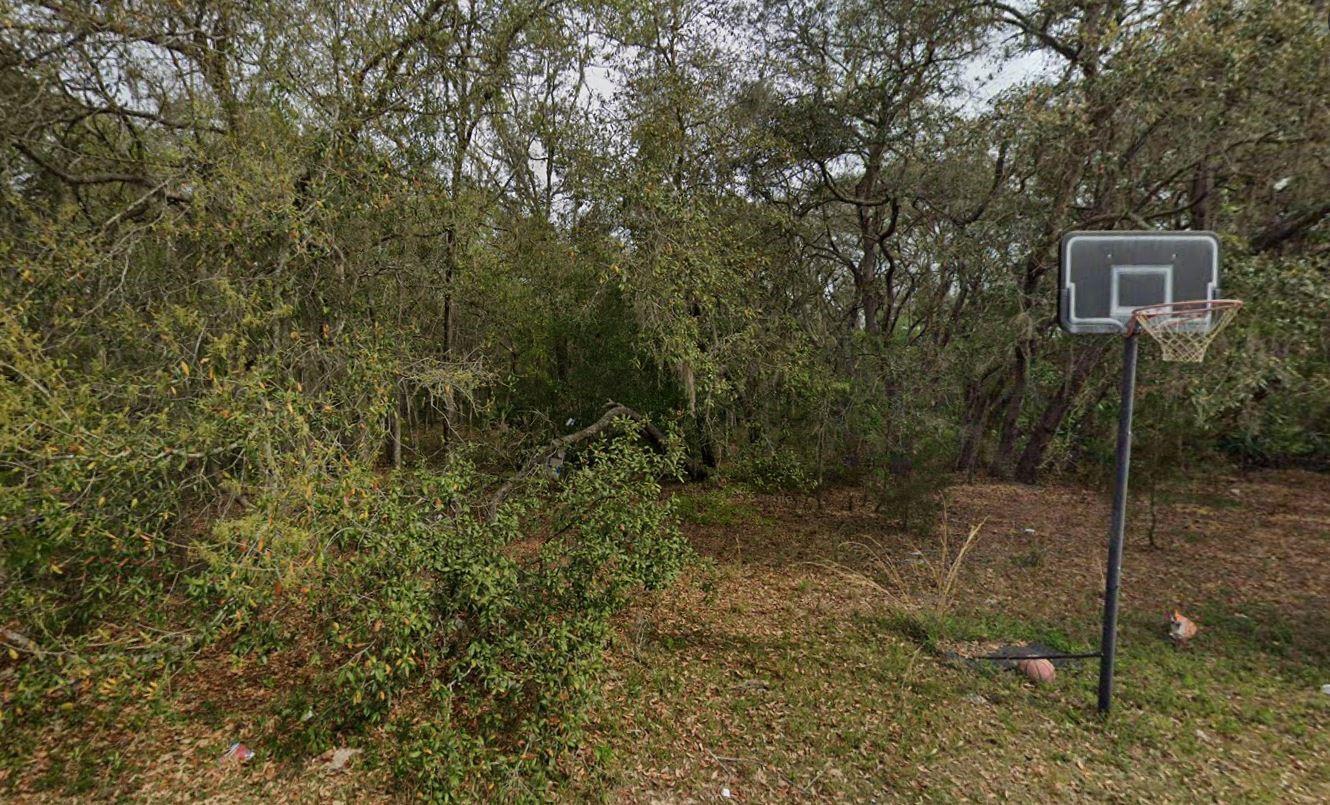 Discover a rare opportunity to own nearly half an acre (0.43?ac) of beautifully wooded land in Interlachen Lakes Estates. This oversized residential lot, measuring approximately 150' x 125', offers a peaceful, park-like setting perfect for building your dream home or retreat among towering oaks. Located just minutes from charming downtown Interlachen and close to spring-fed lakes, this parcel brings together privacy, natural beauty, and convenience. With no HOA and modest annual taxes, this property is a smart investment for those seeking a serene Florida lifestyle. Buyer to verify all utilities, zoning, and development requirements with Putnam County.