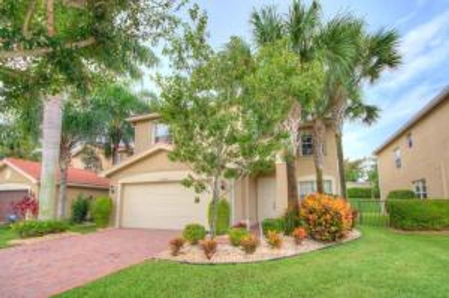 This magnificent 5 bedroom, plus loft, 4 baths, 2 car garage has a spacious open floor plan for todays busy lifestyles. The separate formal living room, with a glass block window, and dining room are perfect for entertaining. The gourmet kitchen is a chef's dream with 42'' cabinets, granite counter tops, tile back splash, stainless steel appliances, family dining area, and snack bar. Master retreat with custom his and her walk in closets, newly renovated frameless walk in shower with upgraded tile, niche, dual sinks and garden tub. This home has tile laid on the diagonal, crown molding, high hat lighting, solar water heater and custom built ins in garage. The covered and extended patio overlooks the private yard. Located close to shopping, restaurants, A rated schools and the Beach.