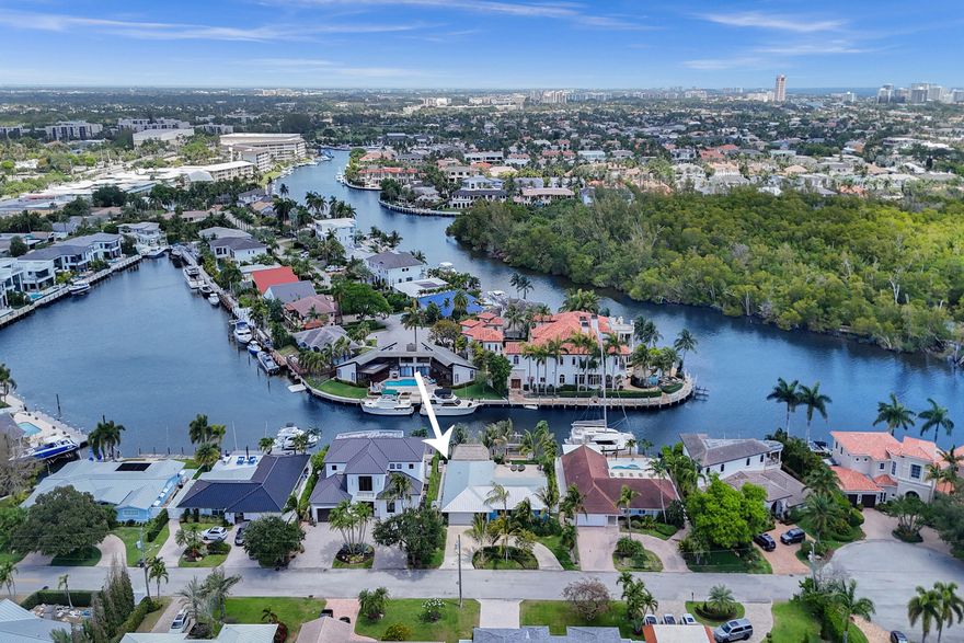 A Coastal Haven in Coveted Little Harbor! Welcome to 1107 Little Harbor Drive, a rare opportunity to own a meticulously maintained, luxuriously renovated and fully furnished 3-bedroom, 2-bathroom waterfront residence in one of Deerfield Beach's most sought-after enclaves. With 80 feet of pristine water frontage in a no-wake zone just off the Hillsboro River, this boater's paradise offers effortless access to the Intracoastal, Boca Inlet, and Hillsboro Inlet. Tucked beside a tranquil cove with sweeping views of both the exclusive estate homes and the protected beauty of Deerfield Island Preserve, this home provides a stunning and serene backdrop for everyday living. The dock, dock pilings, and a 16,000 lb boat lift, all installed in 2022, ensure a seamless boating experience. Perfect for entertaining, the outdoor living space features an oversized pool, fully equipped summer kitchen, and a spacious tiki hut for laid-back luxury. Inside, the home boasts a stunning chef's kitchen with oversized island, luxurious marble countertops, a Viking gas stove and double sided Gaggenau fridge and freezer. The thoughtfully designed split floorplan is complemented by a spacious, light filled family room overlooking the inviting pool and connecting the primary suite including walk-in closet with the two secondary bedrooms and conveniently located cabana bathroom. Additional upgrades include hurricane-rated PGT windows and doors, all new flooring throughout, updated AC ductwork, PVC plumbing, and a smart ADT security system with 8 cameras. A brand new metal roof will be installed in the coming weeks. Set within a prestigious neighborhood, this home is just minutes from world-class dining, shopping, and the award-winning beaches of Deerfield. This is South Florida living at its finest.