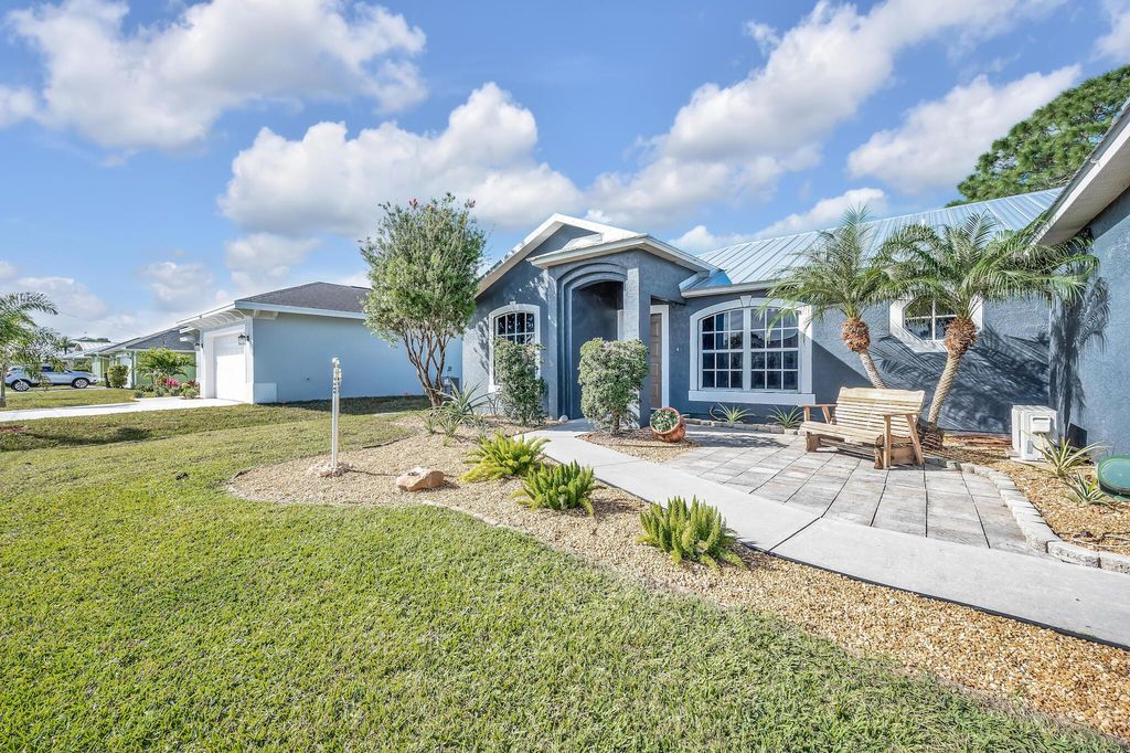 Photo of 6454 NW Fontana Street, Port Saint Lucie, FL 34986 (MLS # R10947689)