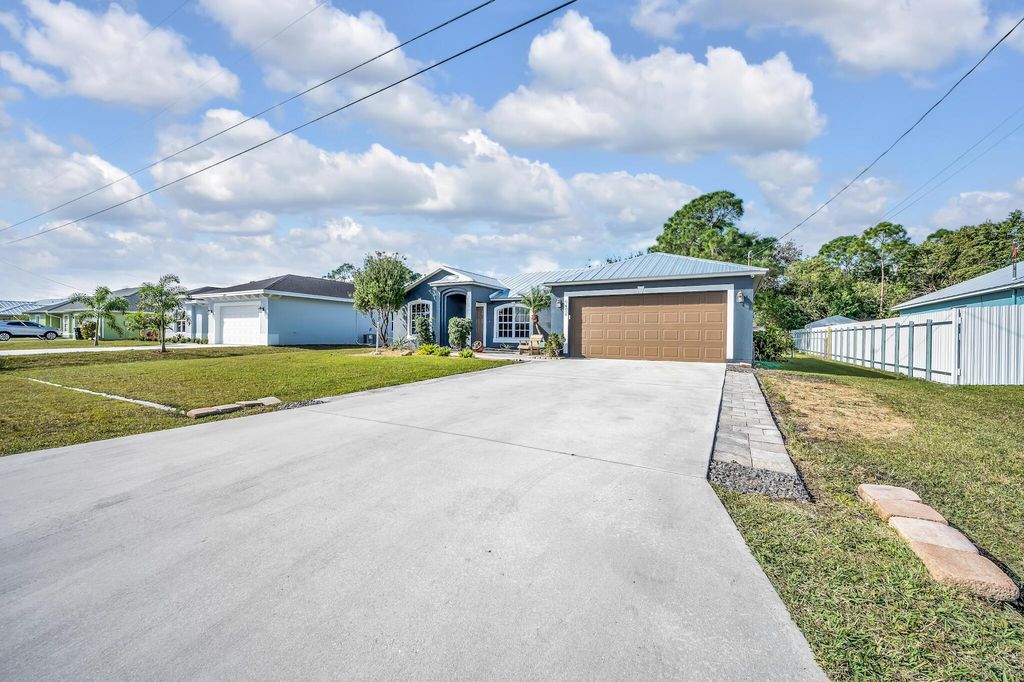 Photo of 6454 NW Fontana Street, Port Saint Lucie, FL 34986 (MLS # R10947689)