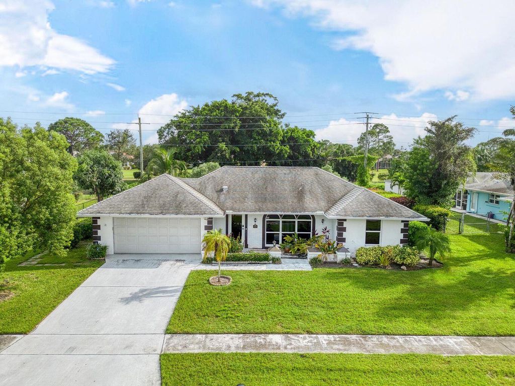 Photo of 1536 SE Sunshine Avenue, Port Saint Lucie, FL 34952 (MLS # R11140494)