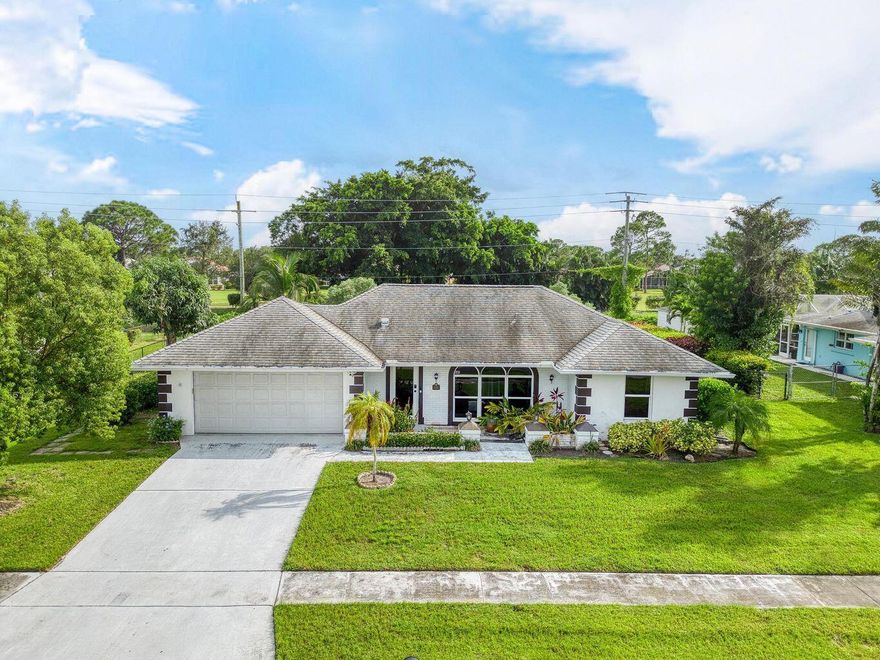 Welcome to this lovely Custom impact windows & doors CBS home featuring 2 bedrooms, 2 full bathrooms, and a spacious 2 car garage, perfectly situated in the heart of the Sandpiper community. You'll love the fenced backyard with room for a pool and a side entrance, perfect for your boat or RV. The A/C was replaced in 2017, and the roof in 2007, giving you peace of mind and comfort for years to come.Property is sold as-is with right to inspect