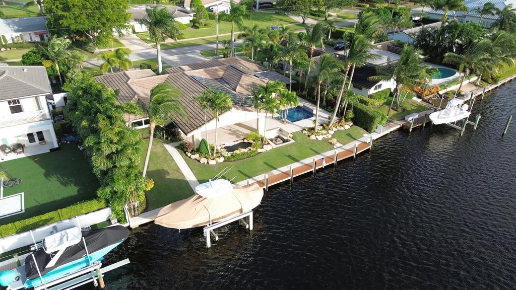 Photo of 1005 COUNTRY CLUB Drive, North Palm Beach, FL 33408 (MLS # B26091151)