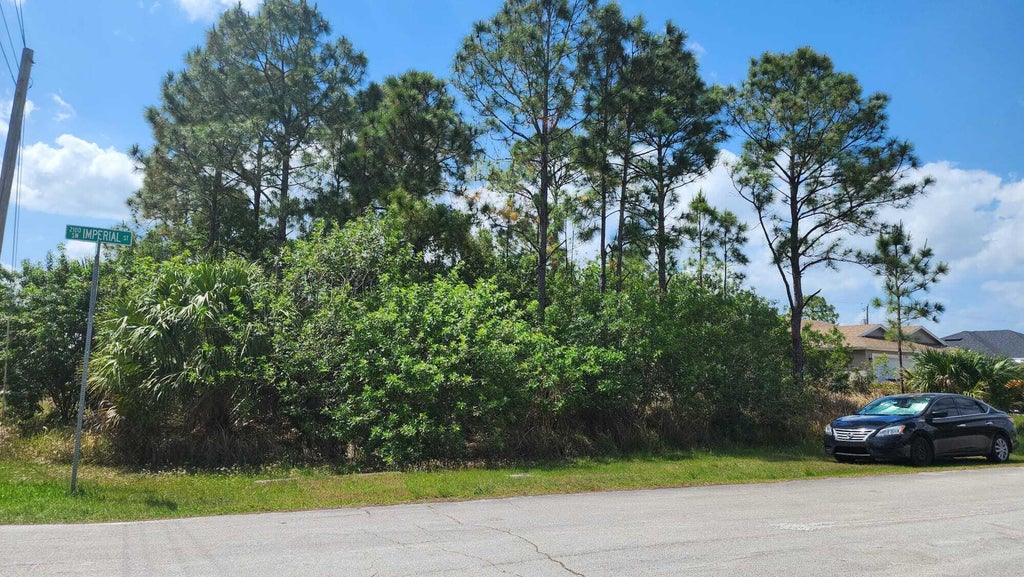 Photo of 2198 SW Imperial Street, Port Saint Lucie, FL 34987 (MLS # R10976206)