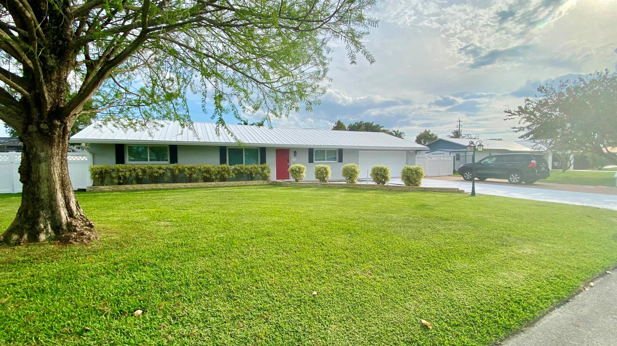 This meticulously maintained 3-bedroom, 2-bath home offers the perfect blend of comfort, convenience, and functionality. The house is newly painted. Enjoy a spacious, fully fenced yard with dual access from both the driveway and the backyard--perfect for parking your RV, boat, trailer, and more. Hurricane-impact windows provide added security and peace of mind.The massive 726 sq. ft. screened-in patio is ideal for entertaining guests or relaxing outdoors. Inside, the home features elegant tile flooring throughout for a clean, modern feel.Additional highlights include a well-water system, keeping the monthly water bill at approximately $30. No HOA. Rent includes lawn maintenance.