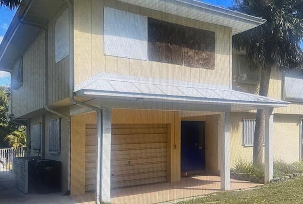 Photo of 12347 S Indian River Drive, Jensen Beach, FL 34957 (MLS # B26007871)
