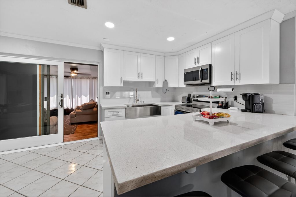 Photo of 4340 N Mary Circle, Palm Beach Gardens, FL 33410 (MLS # B26007557)