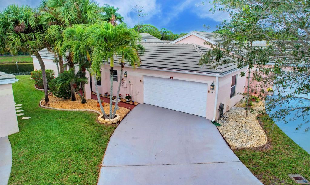 Photo of 1042 Island Manor Drive, Greenacres, FL 33413 (MLS # R10952752)