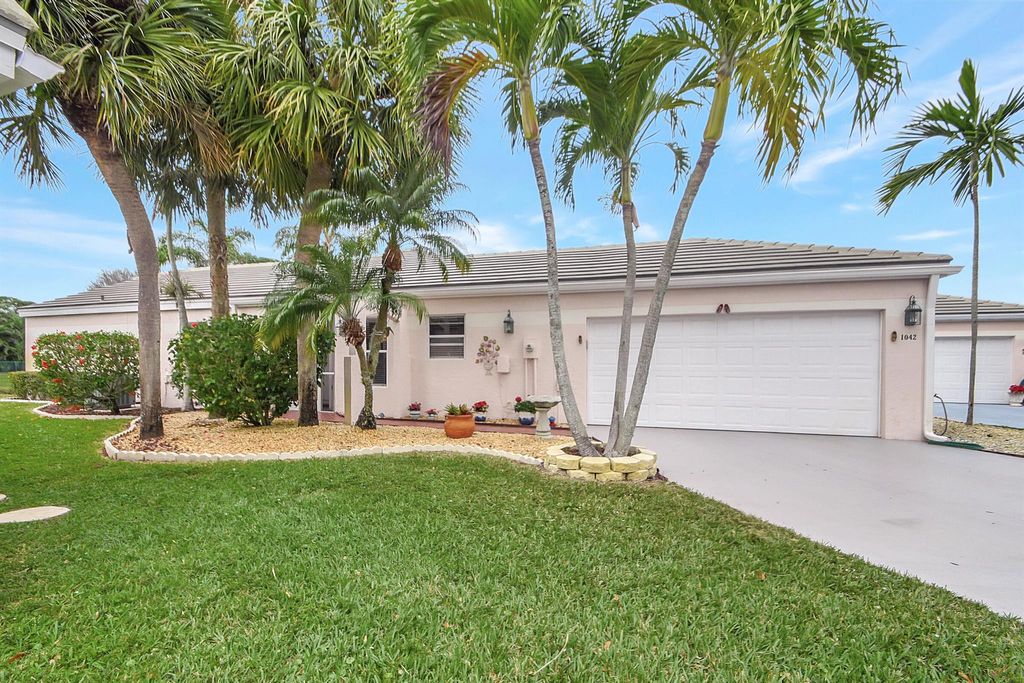 Photo of 1042 Island Manor Drive, Greenacres, FL 33413 (MLS # R10952752)