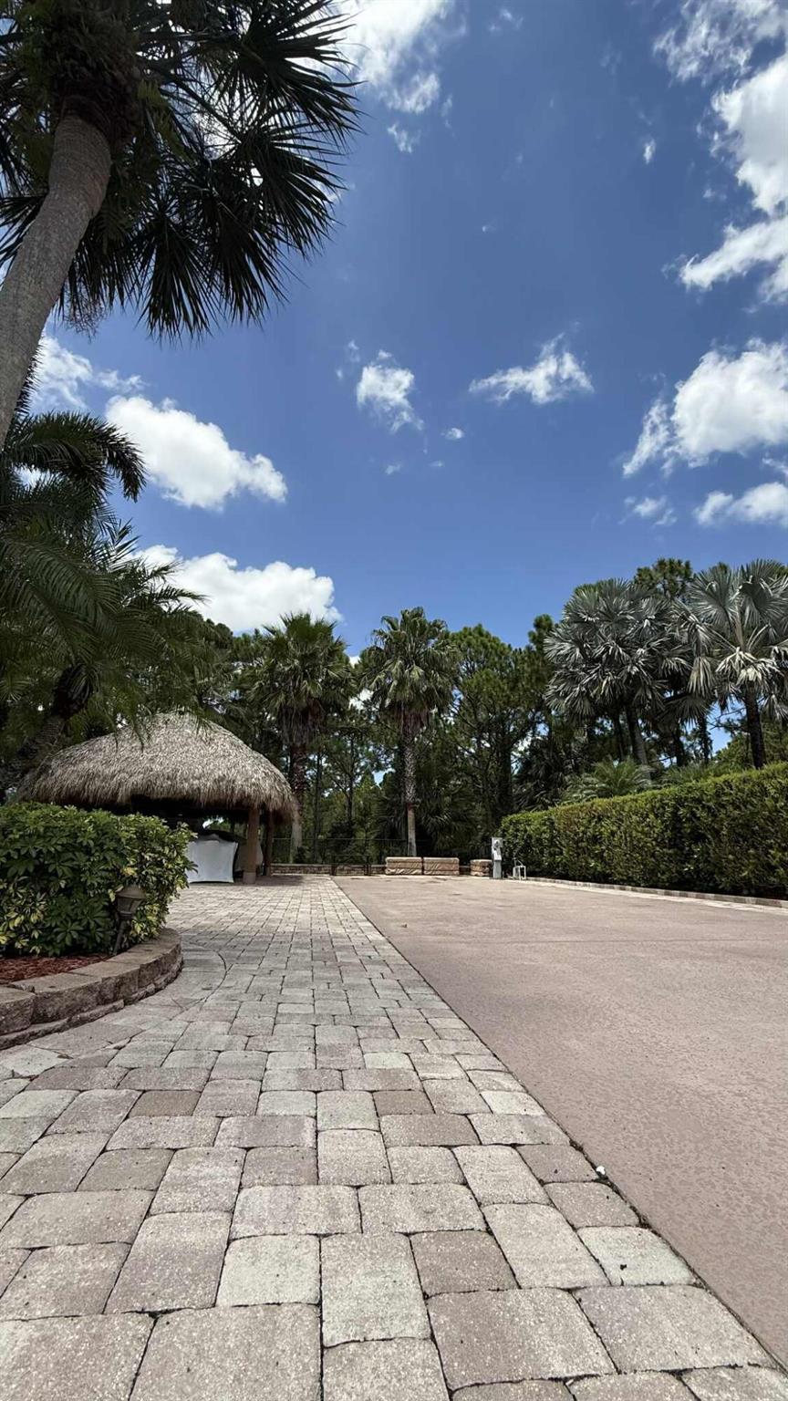 Beautiful lot in desired area in cut da sac. Large lot with newly thatched tiki , full kitchen with large area to prepare food or your favorite cocktail.Turnkey lot all furniture and glassware stays the storage bends also stay. Beautiful place to call home or a winter retreat. Very active community with happy hour during season on Friday nights ,music and dancing. very private lot on preserve 4711 sq ft. Mature landscaping.
