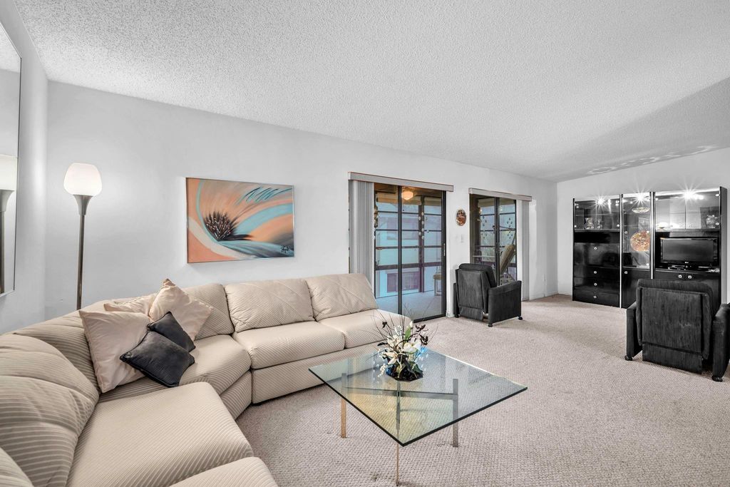 Photo of 10419 E Clairmont Cir #205, Tamarac, FL 33321 (MLS # F10531763)