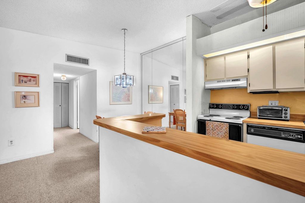 Photo of 10419 E Clairmont Cir #205, Tamarac, FL 33321 (MLS # F10531763)