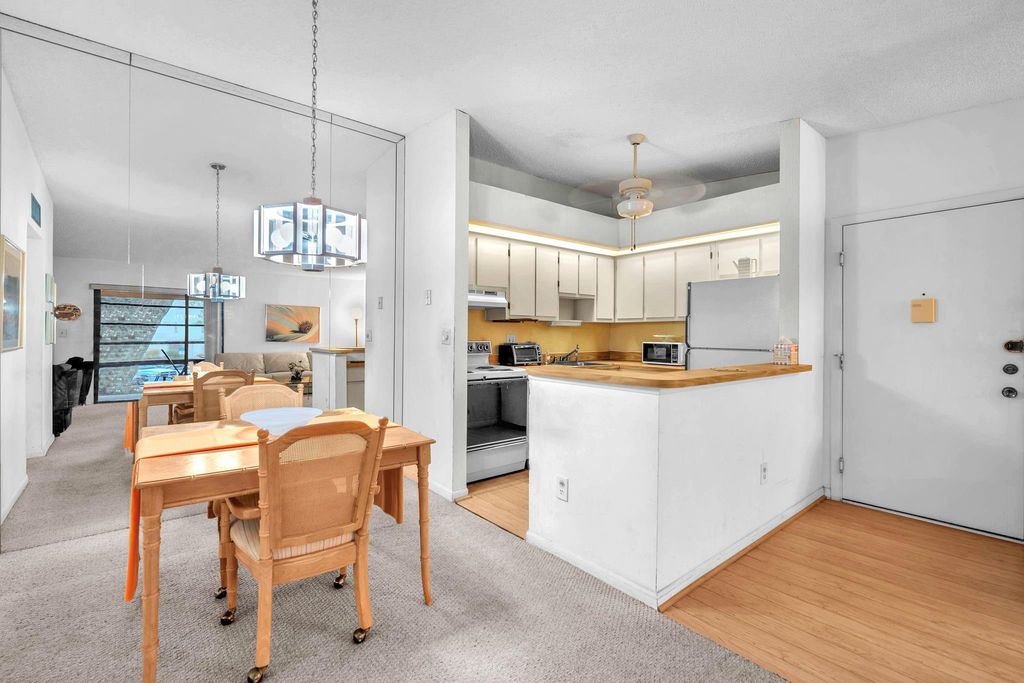 Photo of 10419 E Clairmont Cir #205, Tamarac, FL 33321 (MLS # F10531763)