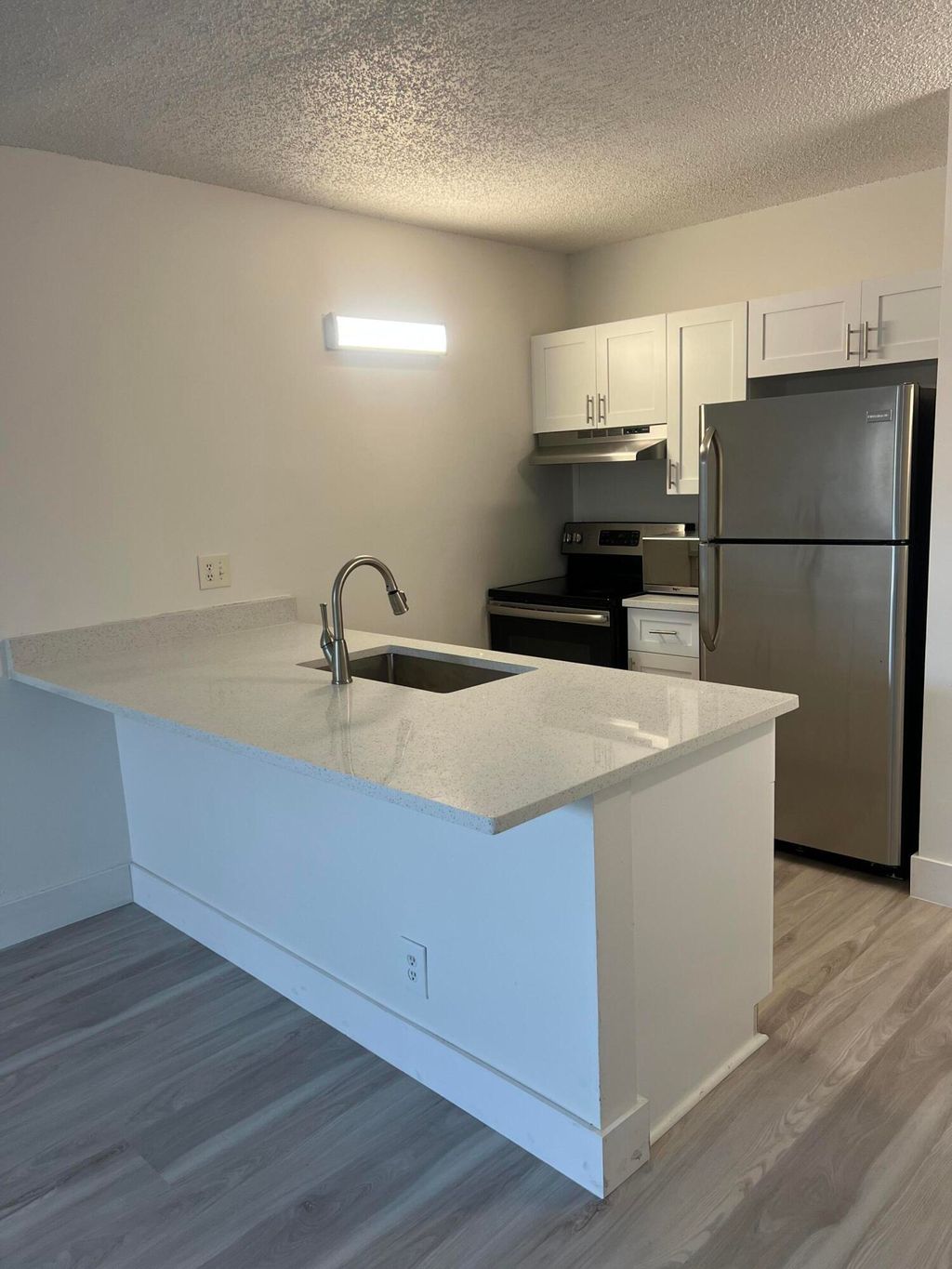 Photo of 2501 Riverside Drive #206-a, Coral Springs, FL 33065 (MLS # B26017495)