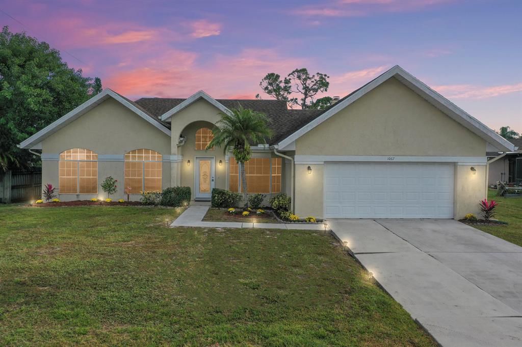 Photo of 1067 SE Floresta Drive, Port Saint Lucie, FL 34983 (MLS # R10762986)