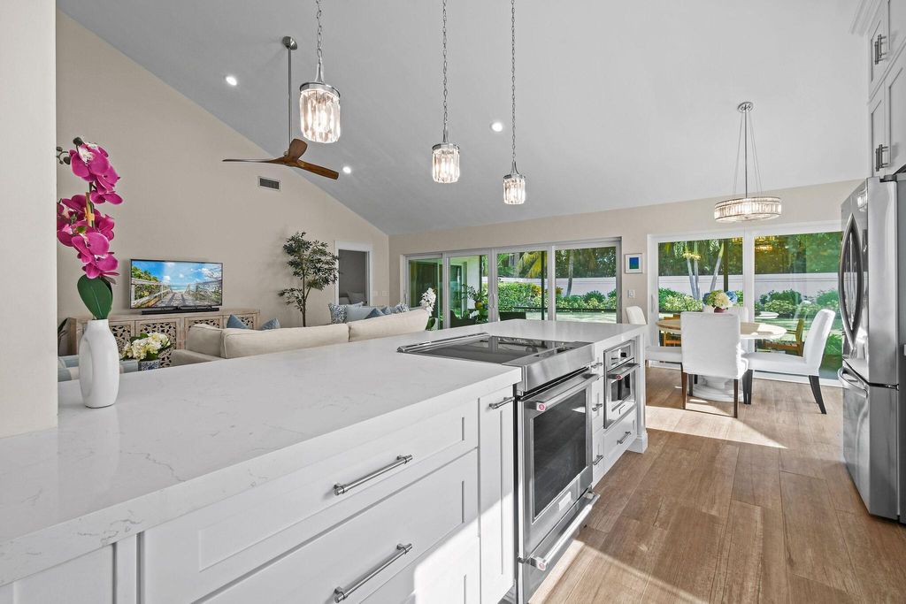 Photo of 125 Sand Pine Drive, Jupiter, FL 33477 (MLS # R11141059)