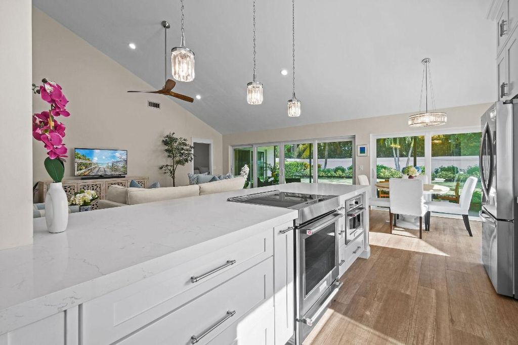 Photo of 125 Sand Pine Drive, Jupiter, FL 33477 (MLS # R11141059)