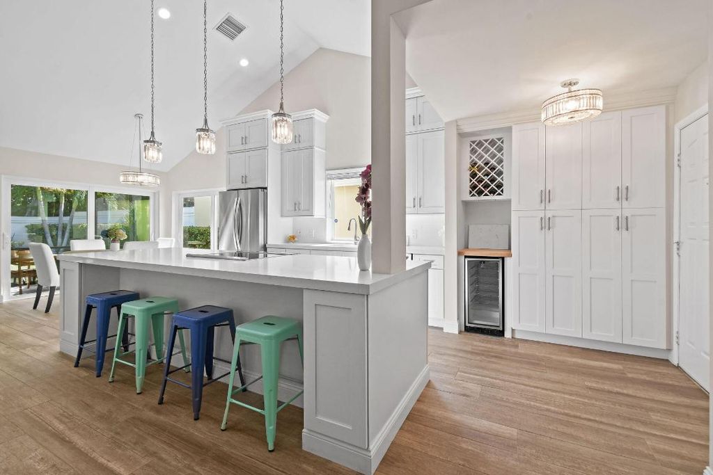 Photo of 125 Sand Pine Drive, Jupiter, FL 33477 (MLS # R11141059)