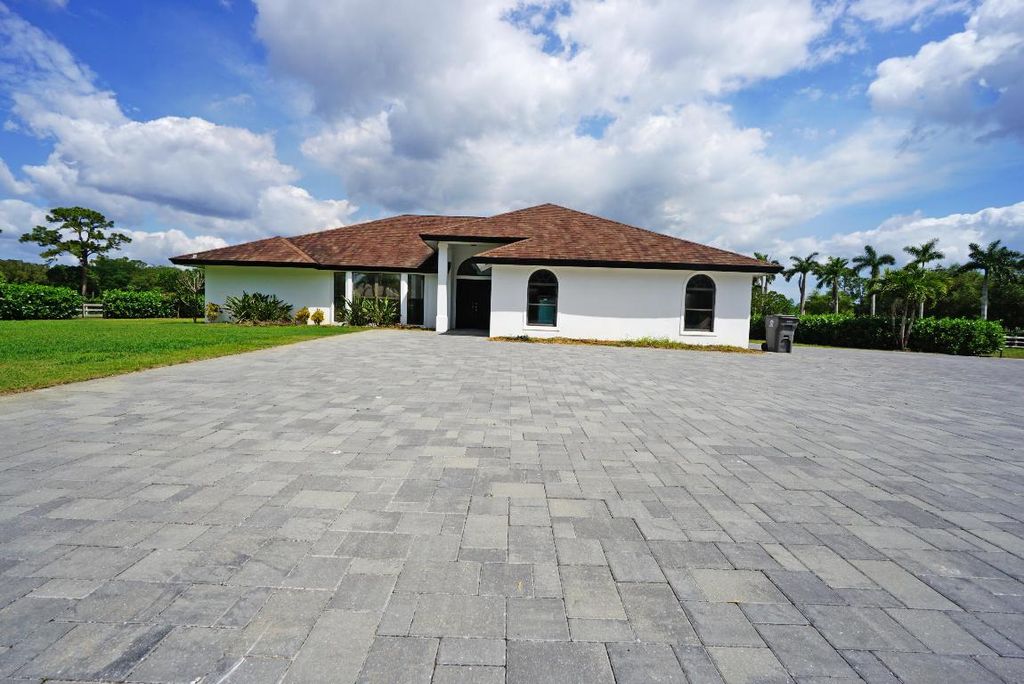 Photo of 14704 Black Bear Road, Palm Beach Gardens, FL 33418 (MLS # R10969797)