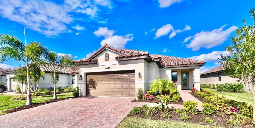 Photo of 12837 SW Ambra Street, Port Saint Lucie, FL 34987 (MLS # R10928623)