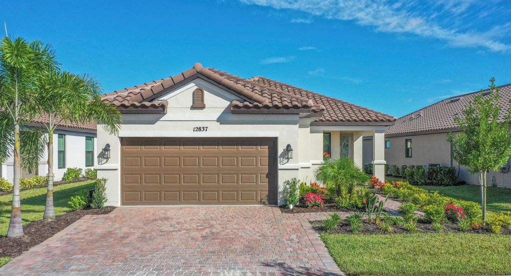 Photo of 12837 SW Ambra Street, Port Saint Lucie, FL 34987 (MLS # R10928623)