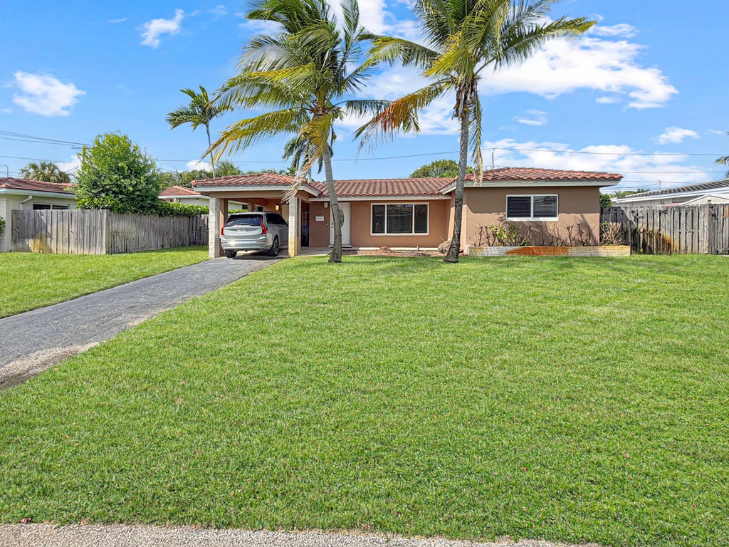 Photo of 1321 NE 46TH Street, Oakland Park, FL 33334 (MLS # B26077399)
