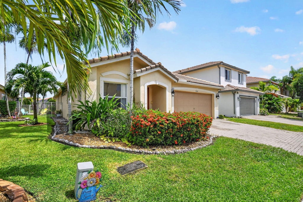 Photo of 1107 Big Torch Street, Riviera Beach, FL 33407 (MLS # B26042976)