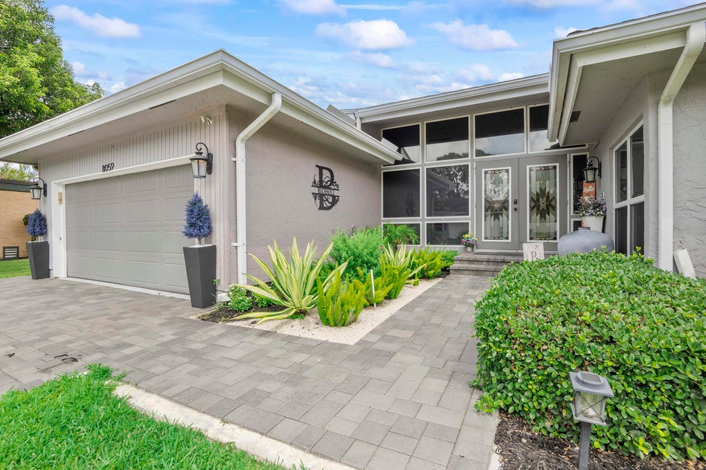 Photo of 8059 BUTTONWOOD Circle, Tamarac, FL 33321 (MLS # B26083461)