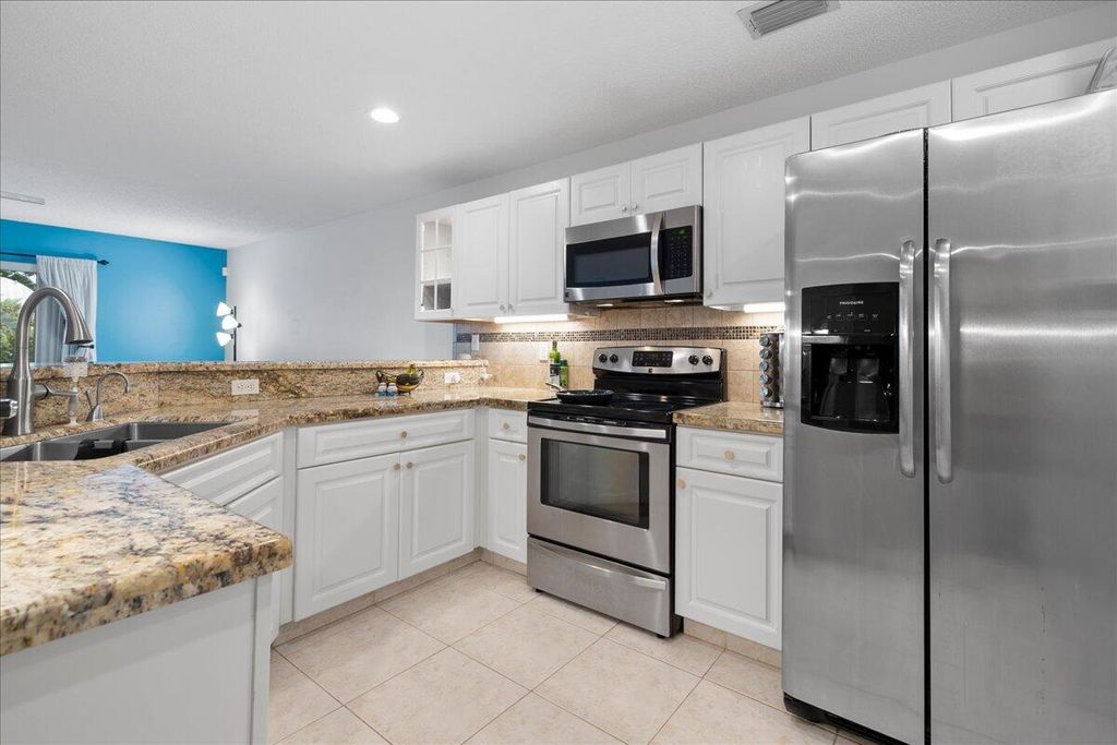 Photo of 137 Fox Meadow Run, Jupiter, FL 33458 (MLS # R10941902)